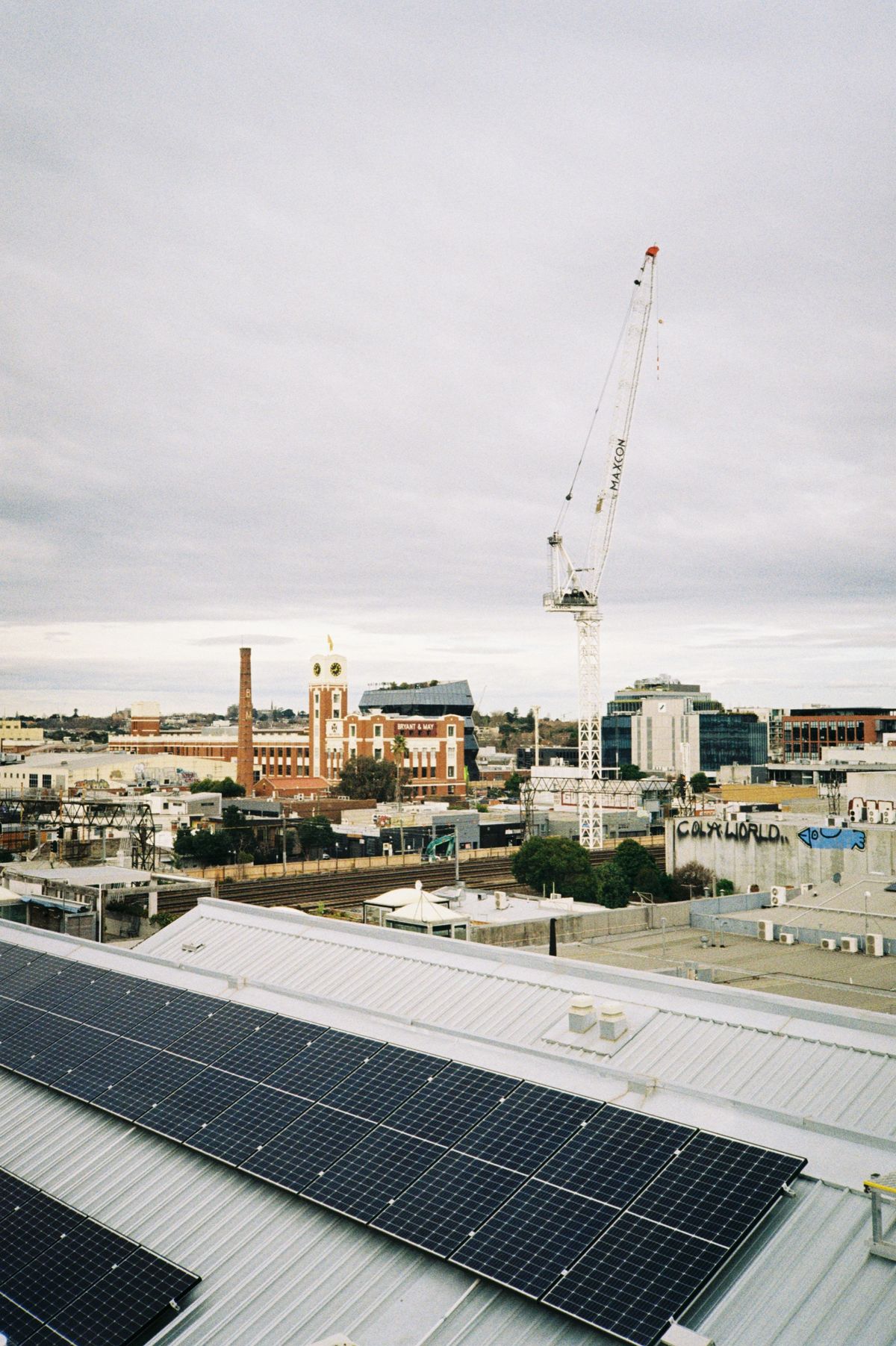 Rooftop Skyline showing a crane and the Bryant and May factory in the distance.